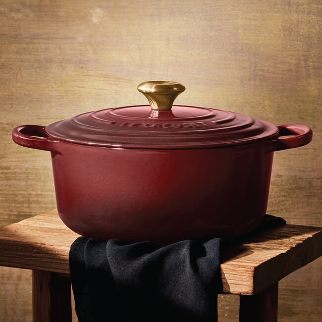 Le Creuset Signature 5.5-Quart Round Enameled Cast Iron Dutch Oven with  Gold Stainless Steel Knob - Rhone
